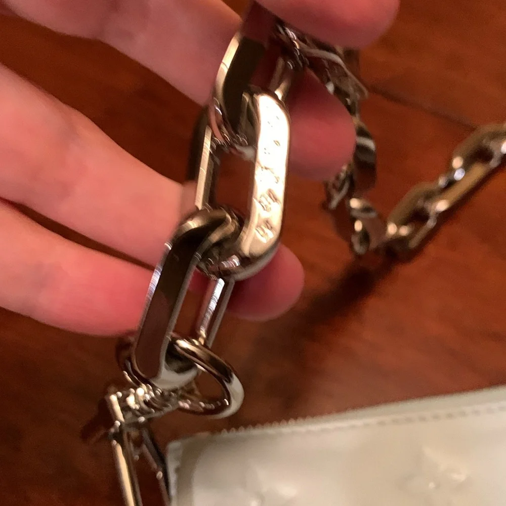 Authentic Brand new Louis Vuitton baby blue color Embossed Leather Chain purse.